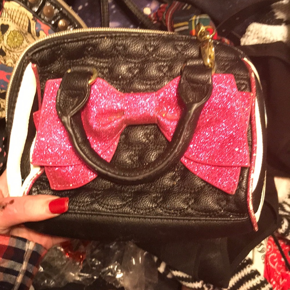 Betsy Johnson broad over bag